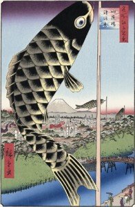 En este grabado de Hiroshige podemos ver las comentas en forma de carpa (koinobori) flotando entre las casas como celebración del Tango no Sekku.