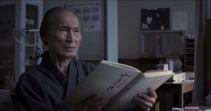 El personaje de Mitsuo Suzuki, en uno de los flashbacks. 
